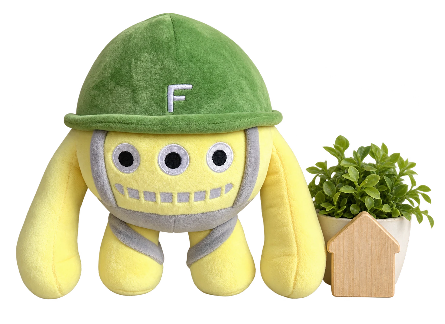 住まいの模型と植物で会社をご案内するボンゴ君